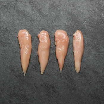 Overhead image of four uncooked Chicken Tenders.
