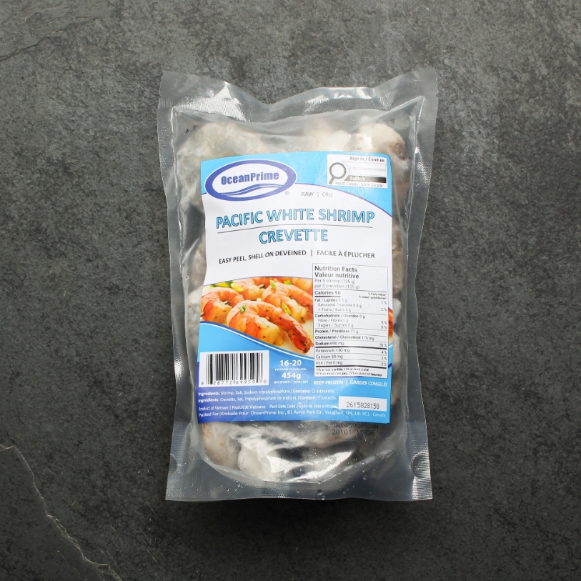 Overhead image of bagged frozen jumbo sized pacific white shrimp