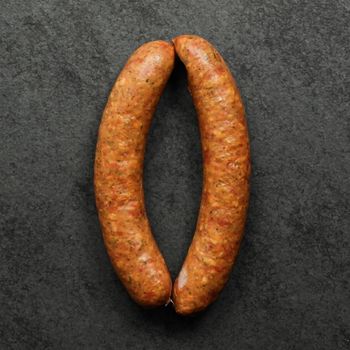 overhead view of two raw european-style sausages