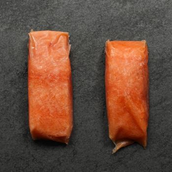 raw, frozen salmon filet