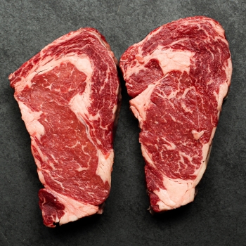 Overhead image of 14 oz Australian Ebony Prime Black Angus Ribeye Steak