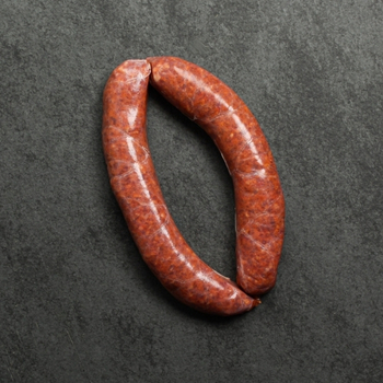 Overhead image of house-made Iberico pork chorizo sausages, uncooked and gluten-free.