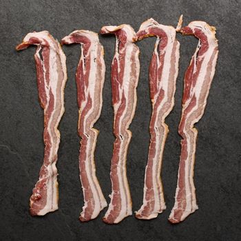 overhead view of raw, sliced bacon