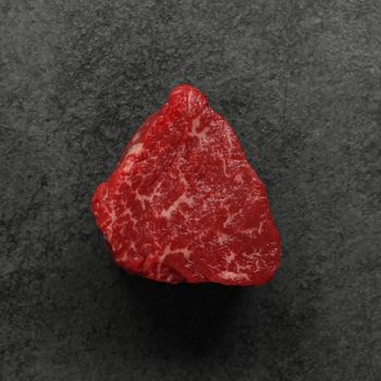 overhead view of a raw American-Wagyu Hybrid 4 oz filet mignon