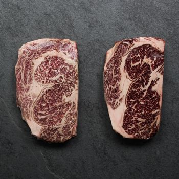 overhead view of a raw American wagyu beef rib eye steak