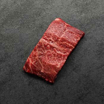 Overhead view of a raw flat iron steak.