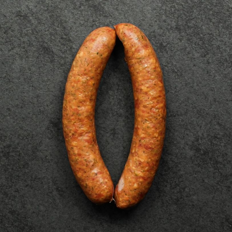 overhead view of two raw european-style sausages