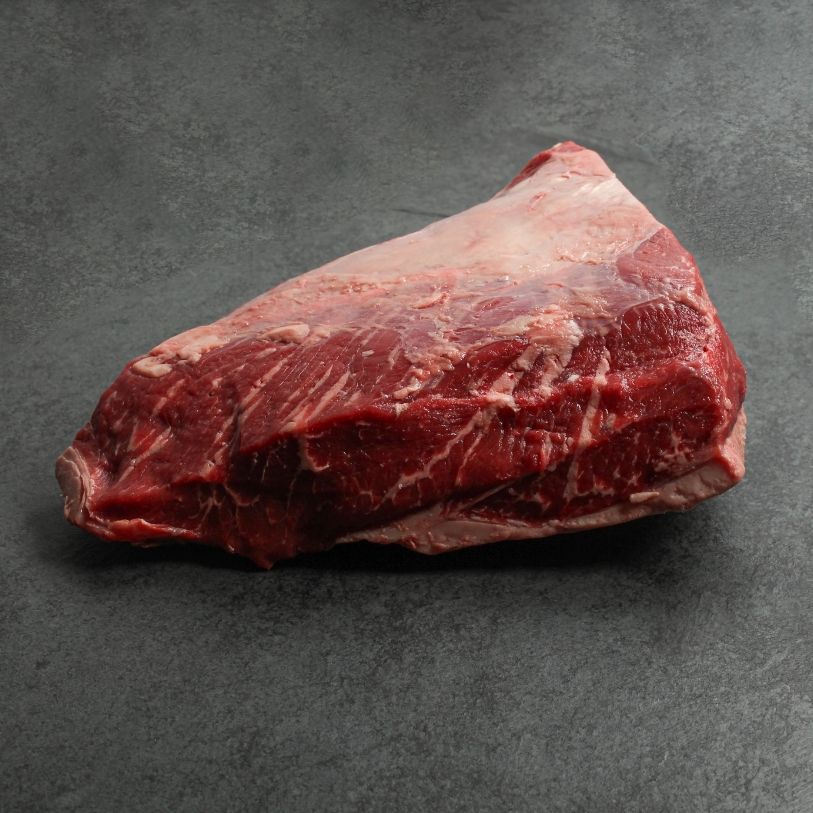 side view of a raw AAA beef picanha roast
