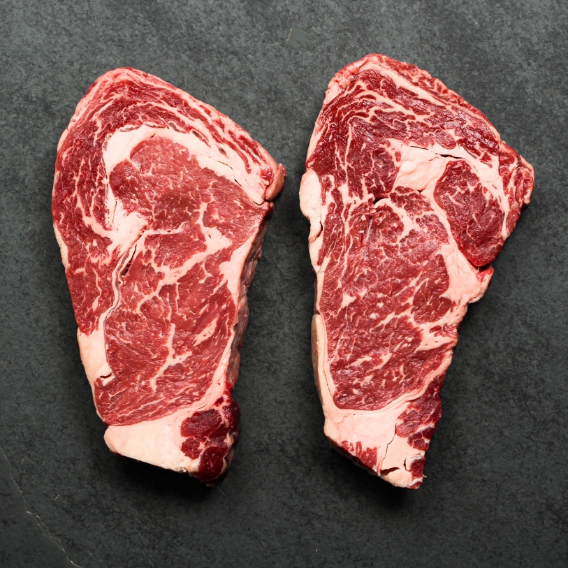 Overhead image of 14 oz Australian Ebony Prime Black Angus Ribeye Steak