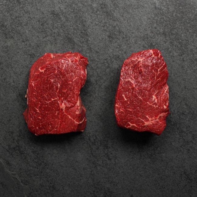 overhead view of two raw Australian wagyu beef sirloin steaks