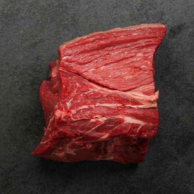 Overhead view of raw pot roast.