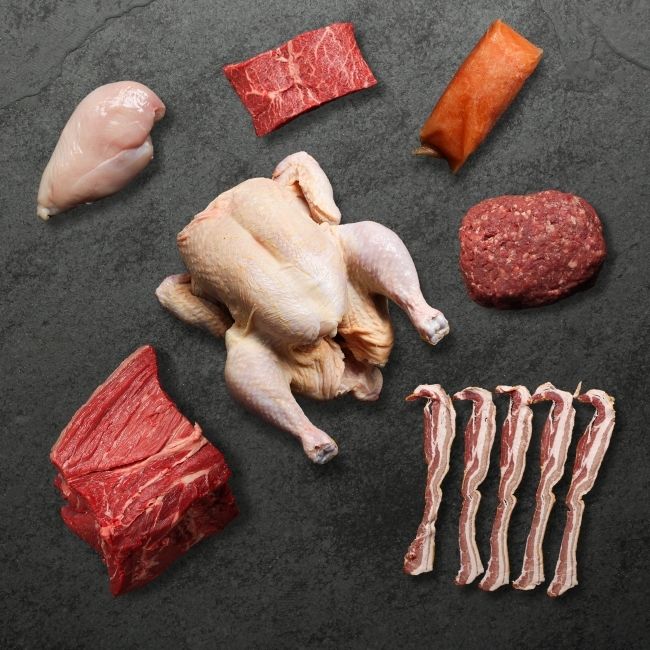 overhead view of seven different raw proteins