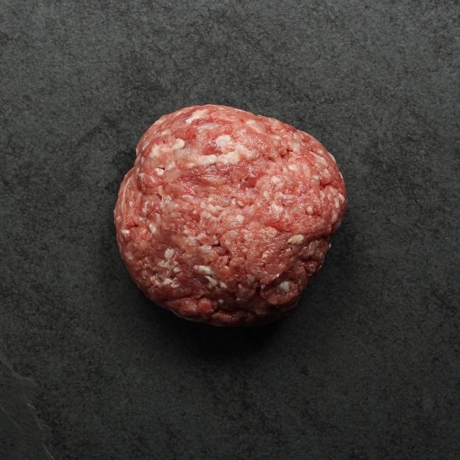 overhead view of a ball of raw ground turkey