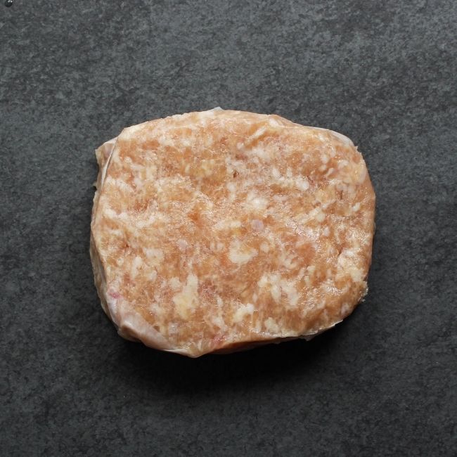 overhead view of two frozen Honey Garlic Chicken Burgers stacked on each other
