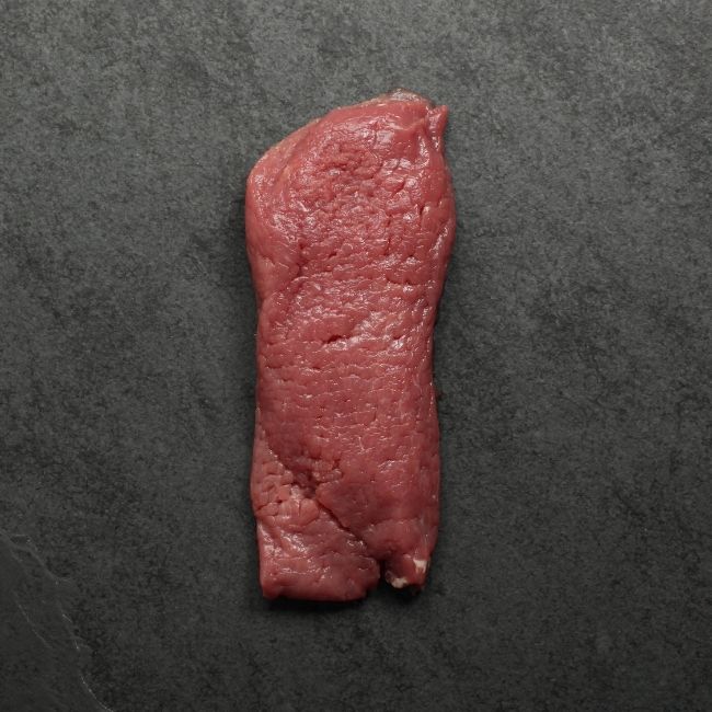 overhead view of a raw veal cutelet