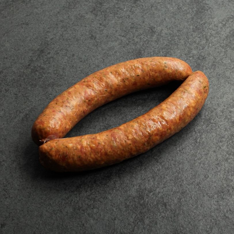 angled view of two raw european-style sausages
