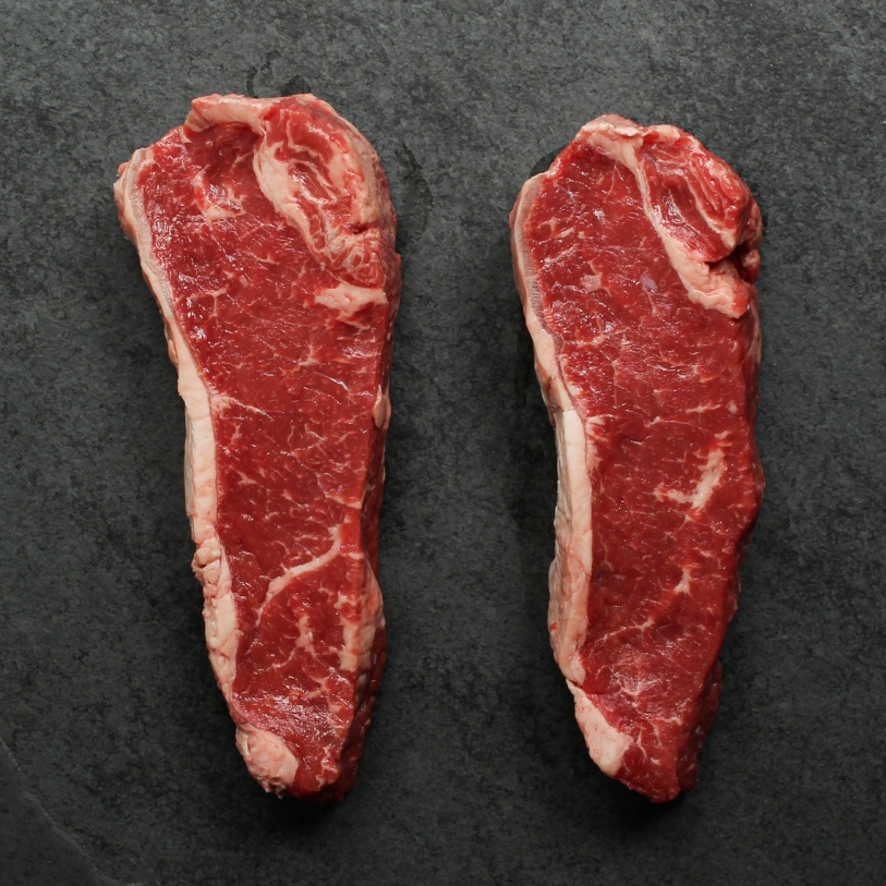 overhead view of a Halal beef new york strip steak