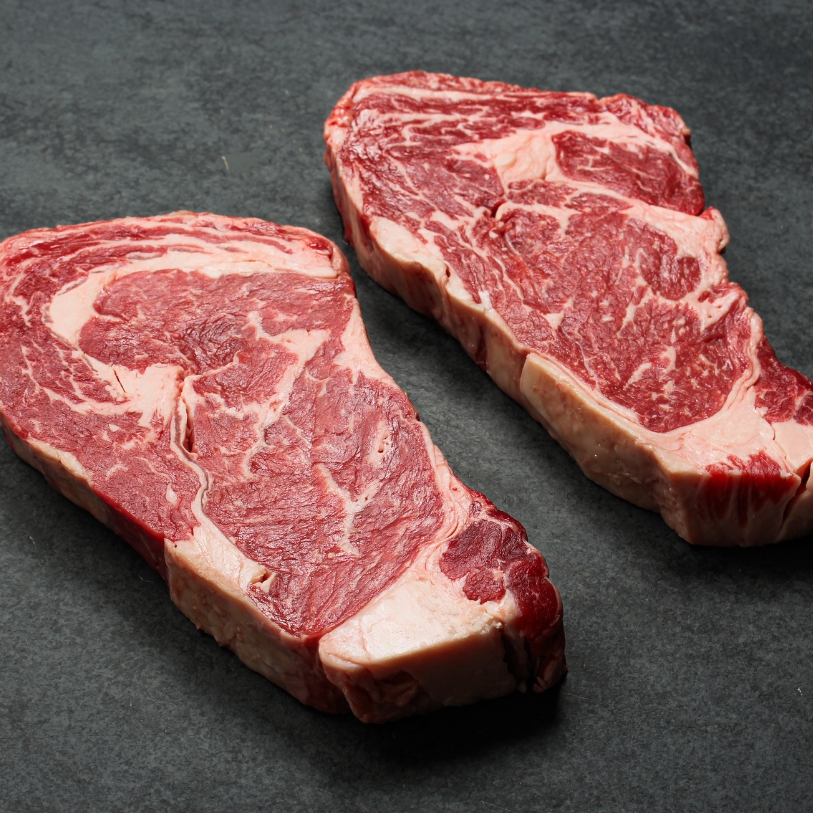 Angled image of 14 oz Australian Ebony Prime Black Angus Ribeye Steak