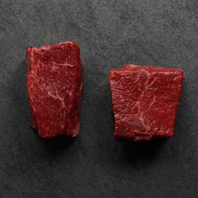 overhead view of two well-marbled sirloin steaks