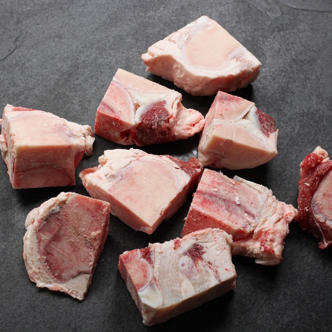 angled view of 9 pieces of beef bones