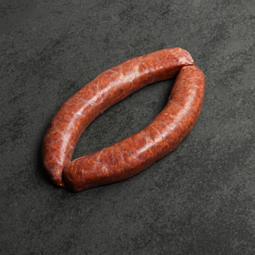 Overhead image of house-made Iberico pork chorizo sausages, uncooked and gluten-free.