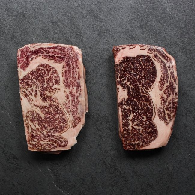 overhead view of a raw American wagyu beef rib eye steak