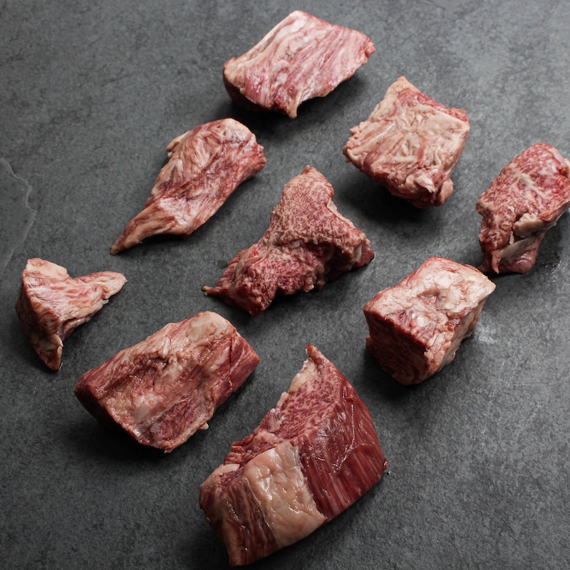 angled view of a selection of raw wagyu beef tenderloin tips
