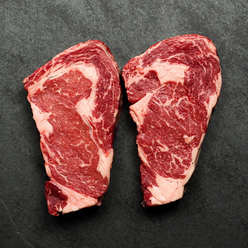 Overhead image of 14 oz Australian Ebony Prime Black Angus Ribeye Steak