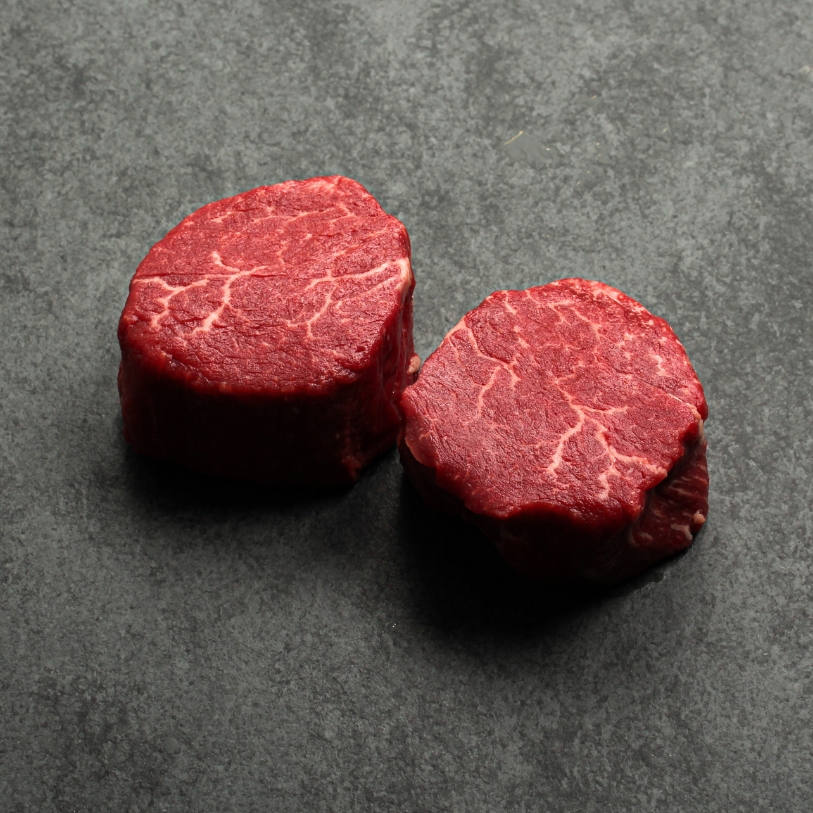 Angled image of two, 6 oz Australian Wagyu Beef Filet Mignon.