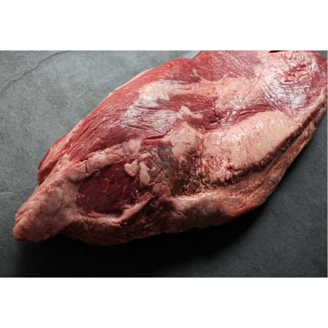 close-up image of the fatty side of a raw beef brisket