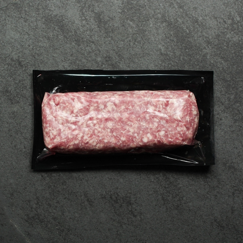 Overhead image of vacuum packaged ground pork.