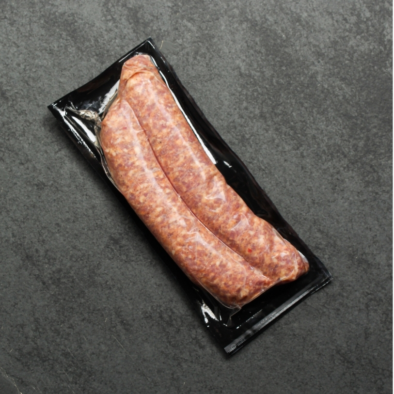Overhead of Hot Italian Chicken Sausage in vacuum sealed packaging