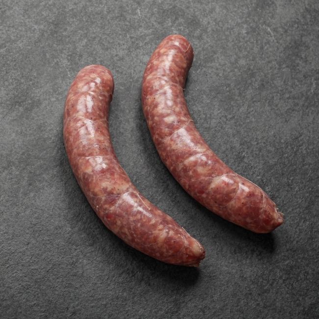 angled view of two mild Italian sausages