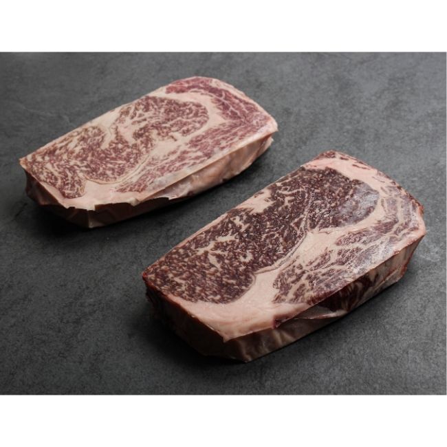 angled view of a raw American wagyu beef rib eye steak