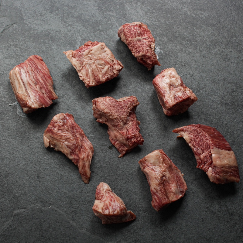 angled view of a selection of raw wagyu beef tenderloin tips