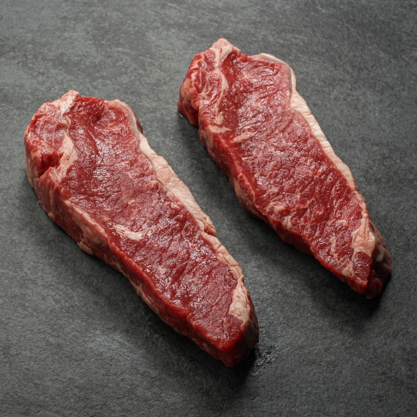 angled view of a Halal beef new york strip steak