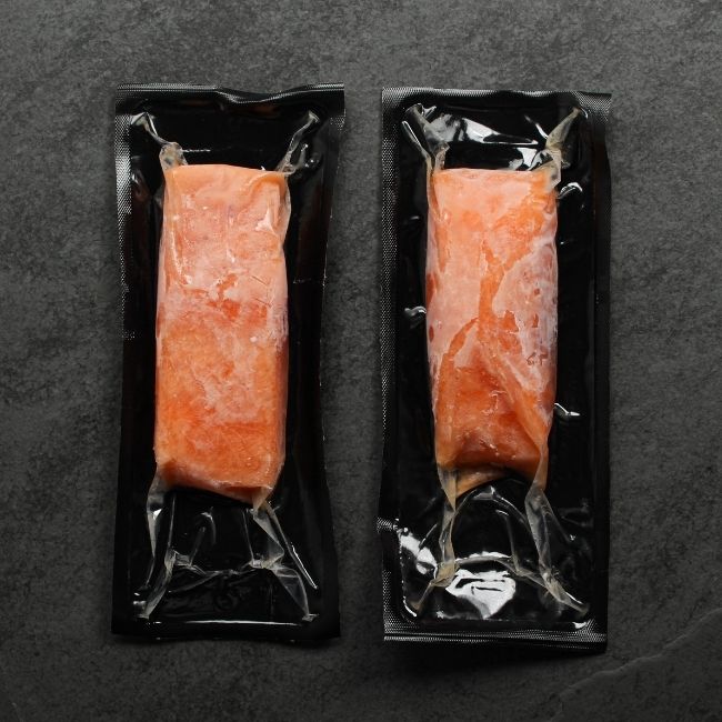raw, frozen salmon filet