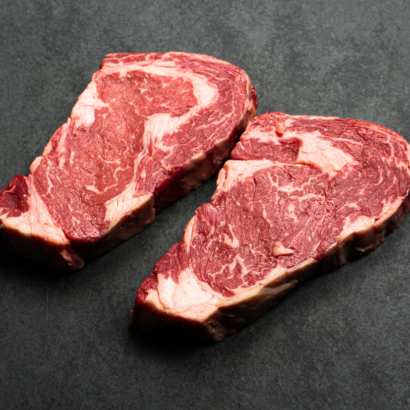 Angled image of 14 oz Australian Ebony Prime Black Angus Ribeye Steak