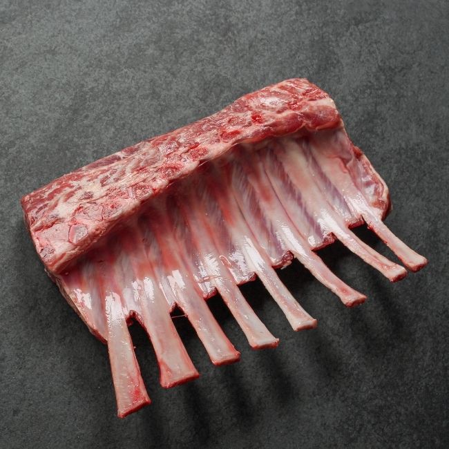 angled view of an Australian lamb rack with Frenched bones