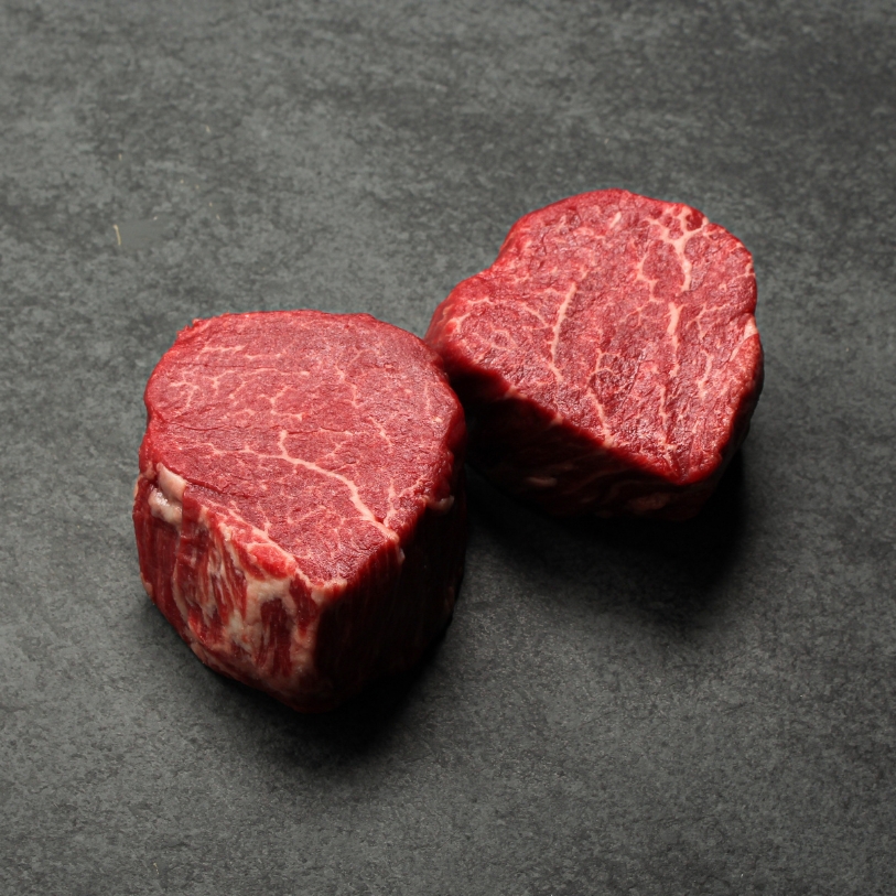 Angled image of two, 6 oz Australian Wagyu Beef Filet Mignon.
