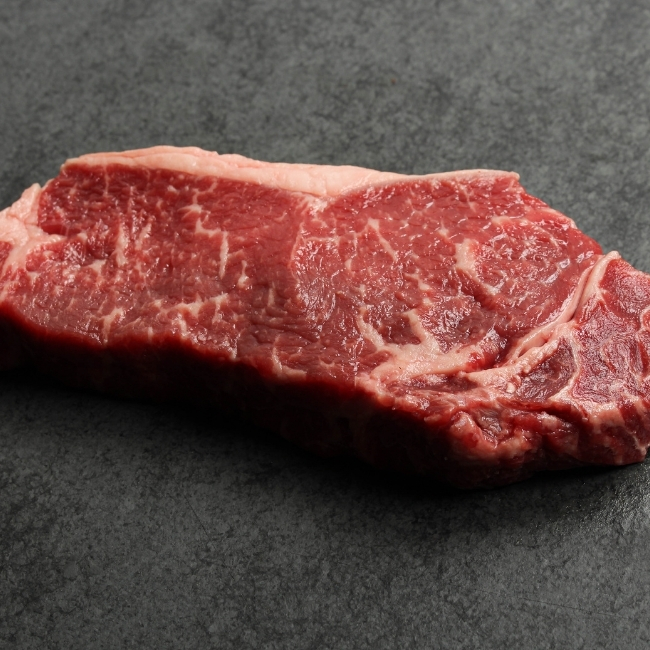 Close-up of a raw New York steak.