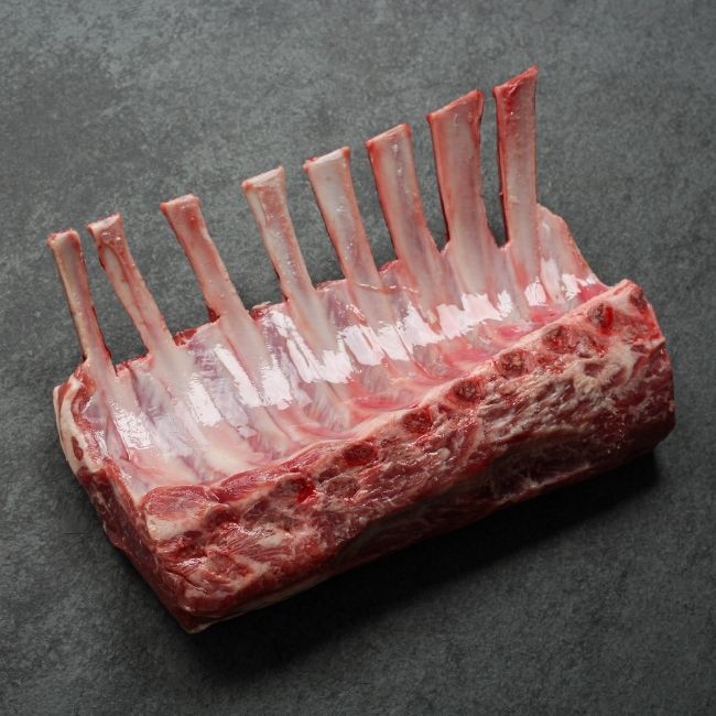 angled view of an Australian lamb rack with Frenched bones