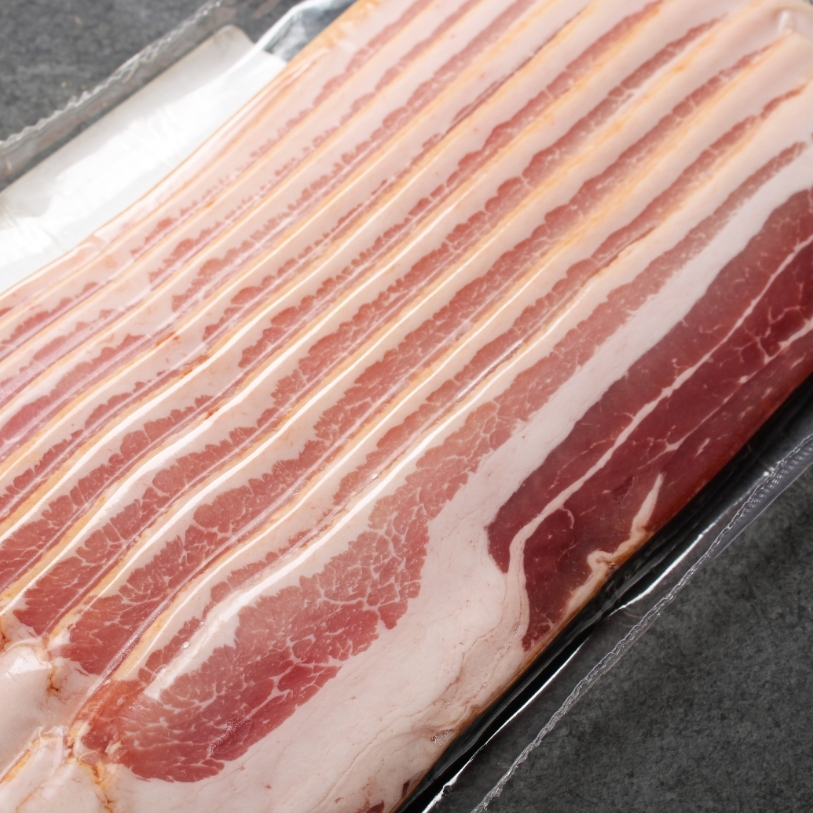 Close up view of raw, sliced bacon from Metzger's Meats  in vacuum package