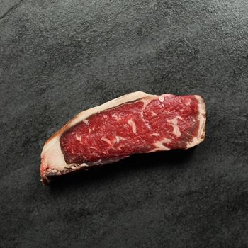 Overhead view of dry aged New York steak.